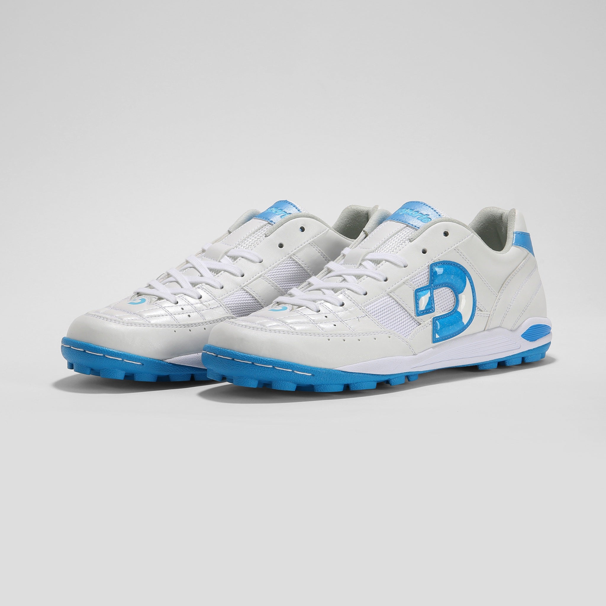 Desporte Rio KT2 white turf soccer boots with turquoise logo and sole