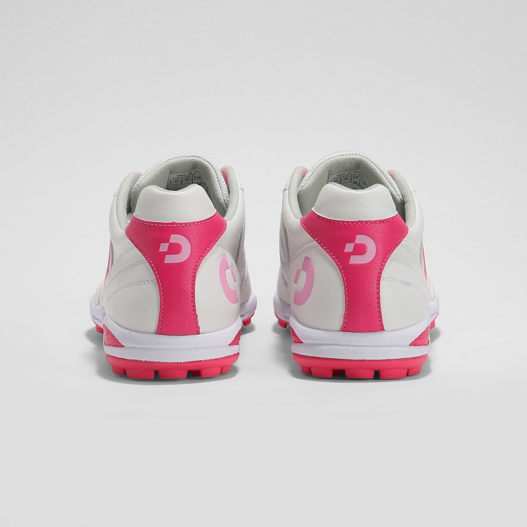 Desporte Rio KT2 white turf soccer boots with pink logo and sole backview